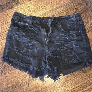 Black distressed shorts